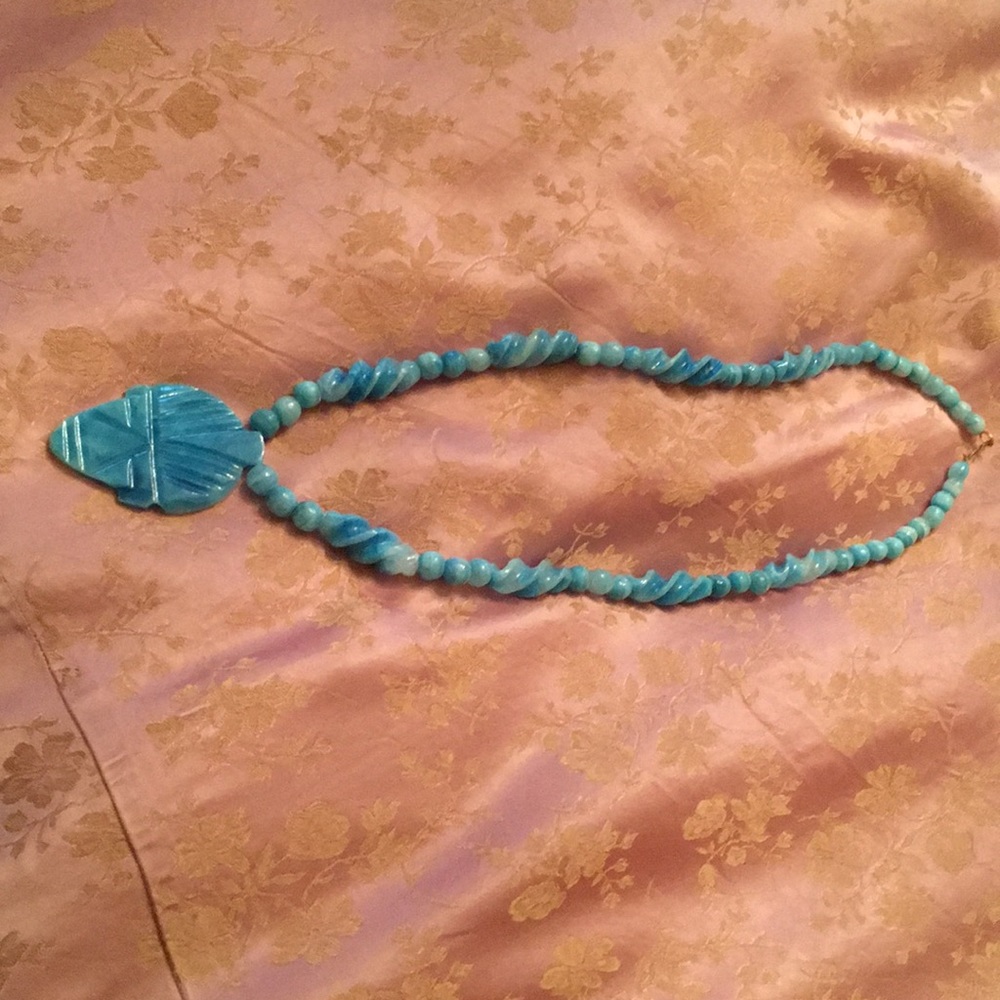 Blue necklace made out of glass beautiful